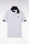 Relaxed-fit short-sleeved polo shirt in red cotton with colorful accents