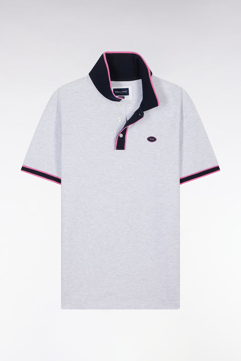 Relaxed-fit short-sleeved polo shirt in pink cotton with colorful stripes - Image 2