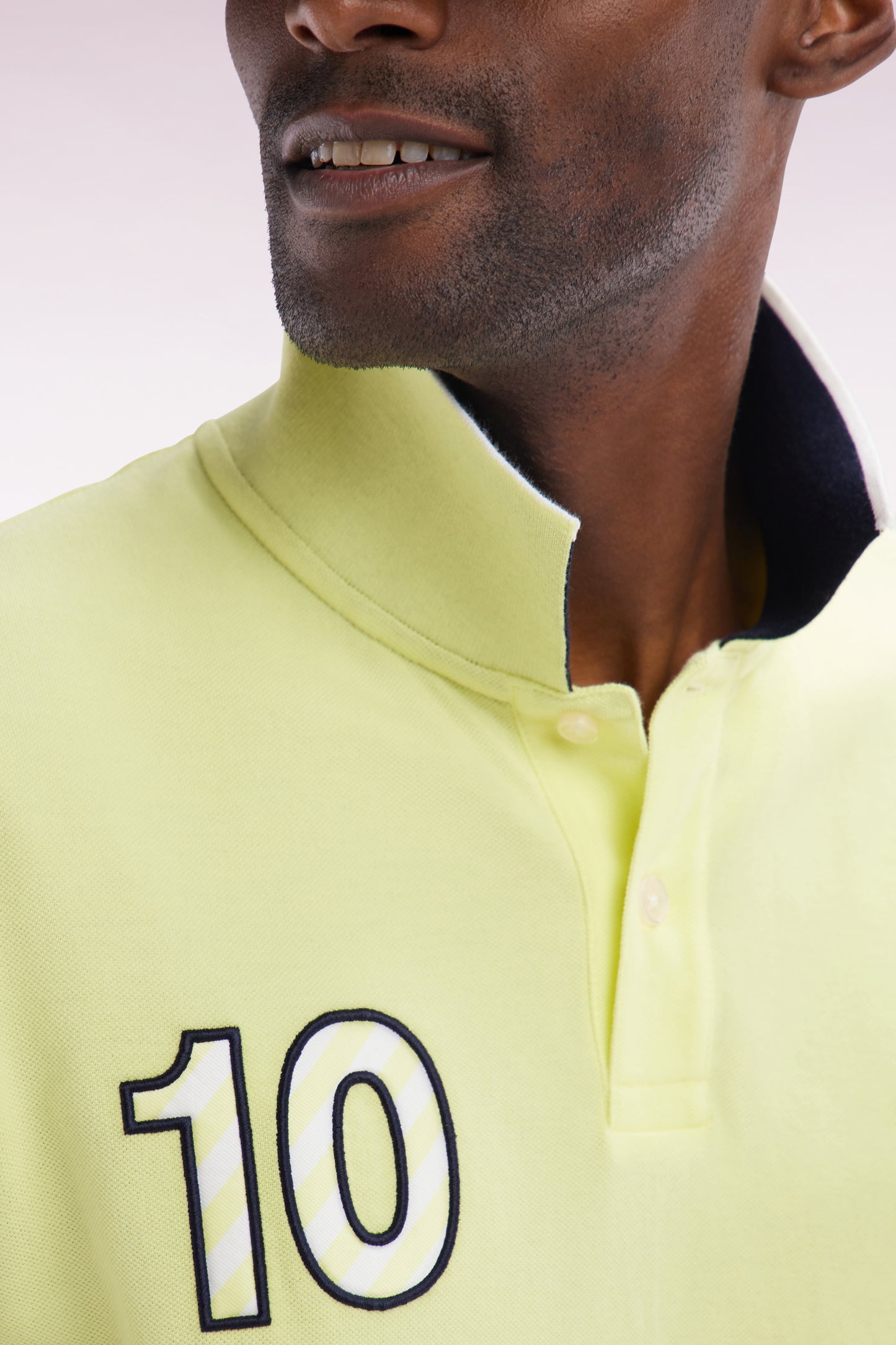 Relaxed-fit short-sleeved polo shirt in yellow cotton with 10 embroidery