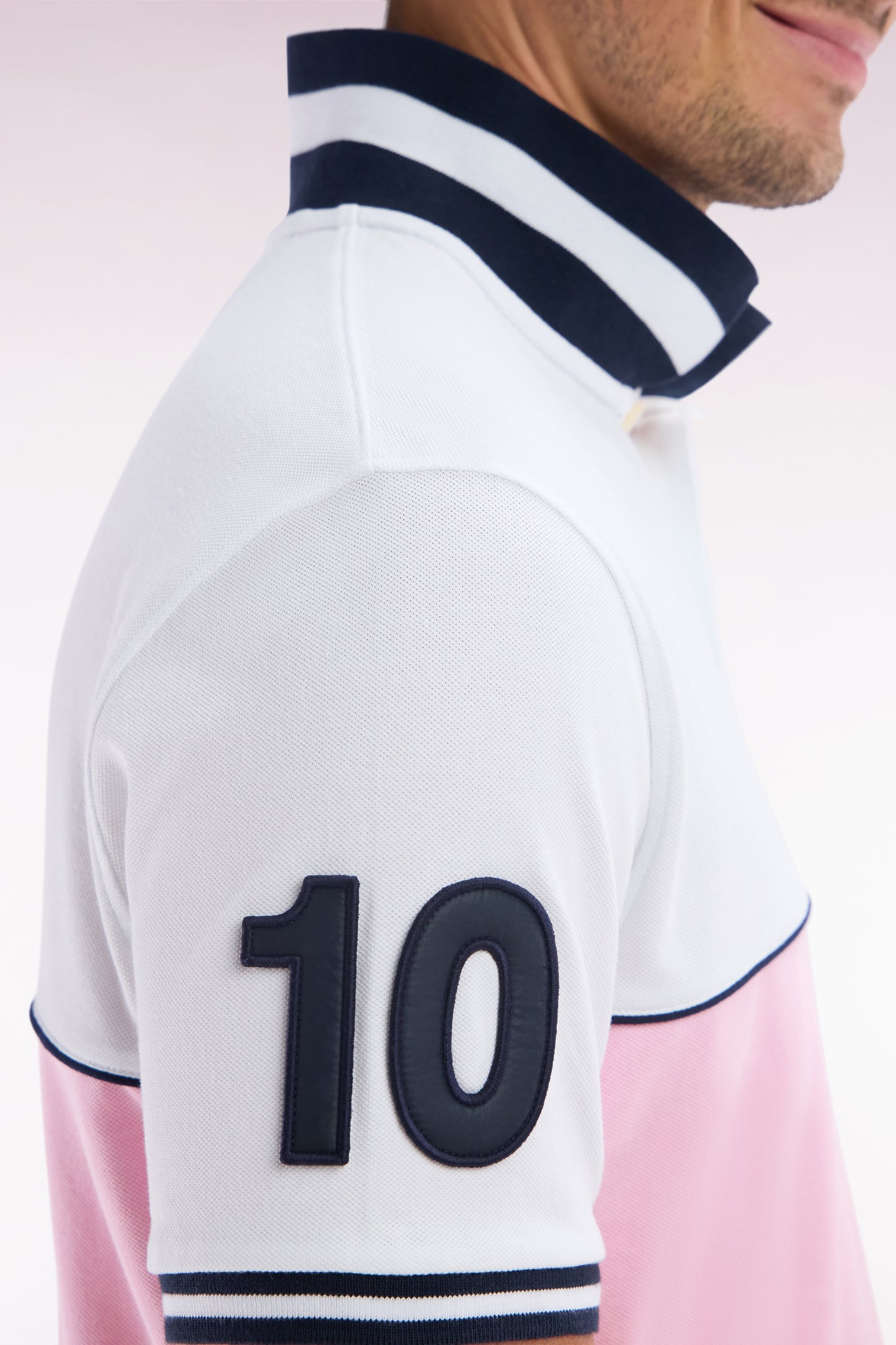 Relaxed-fit two-tone short-sleeved polo shirt in pink and white cotton