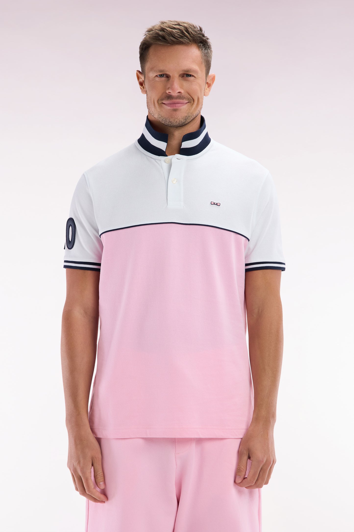 Relaxed-fit two-tone short-sleeved polo shirt in pink and white cotton