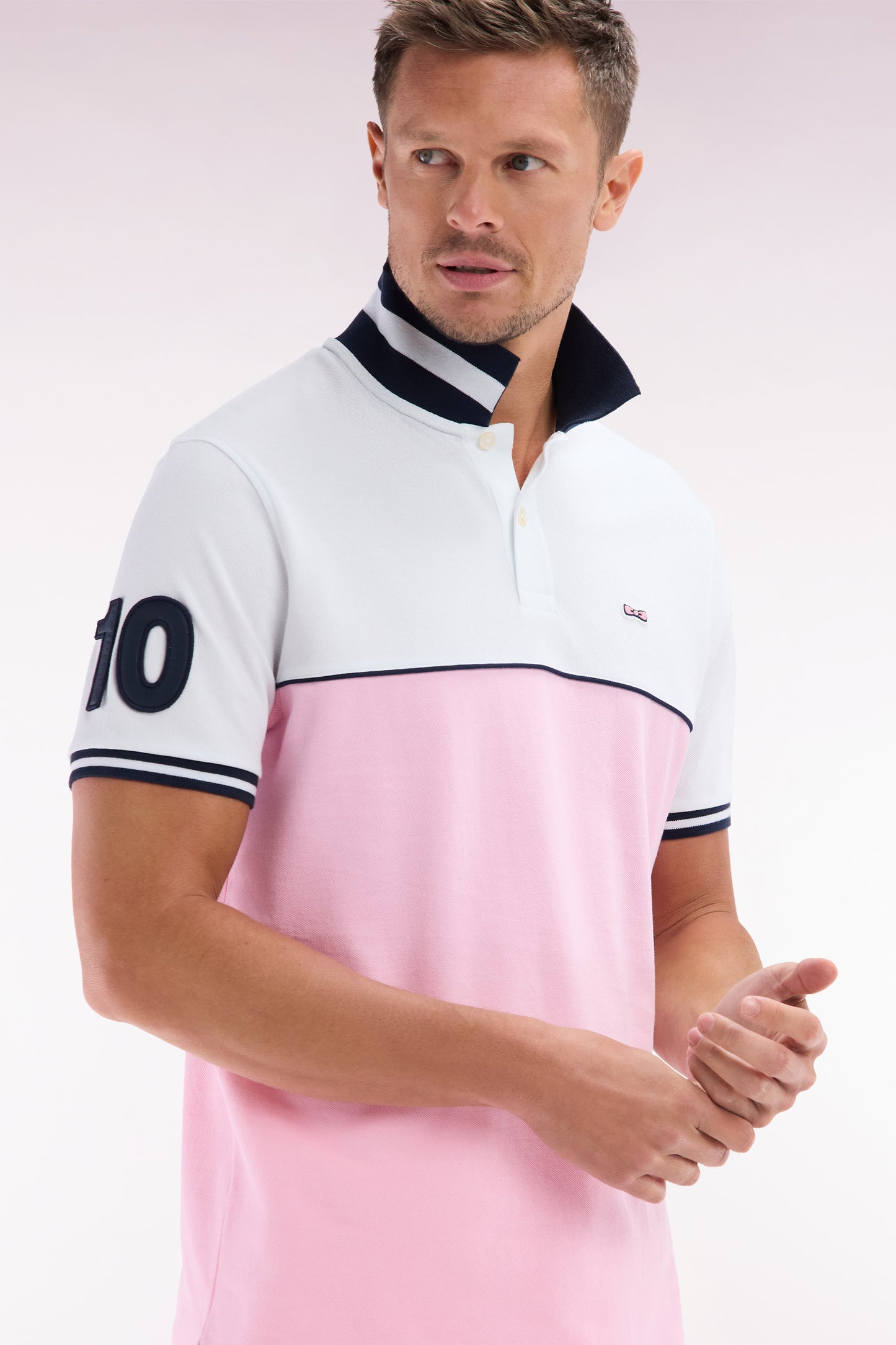 Relaxed-fit two-tone short-sleeved polo shirt in pink and white cotton