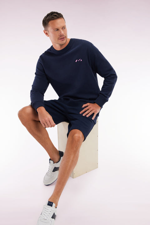 Relaxed-fit navy cotton fleece shorts with a striped bow tie embroidery - Image 3