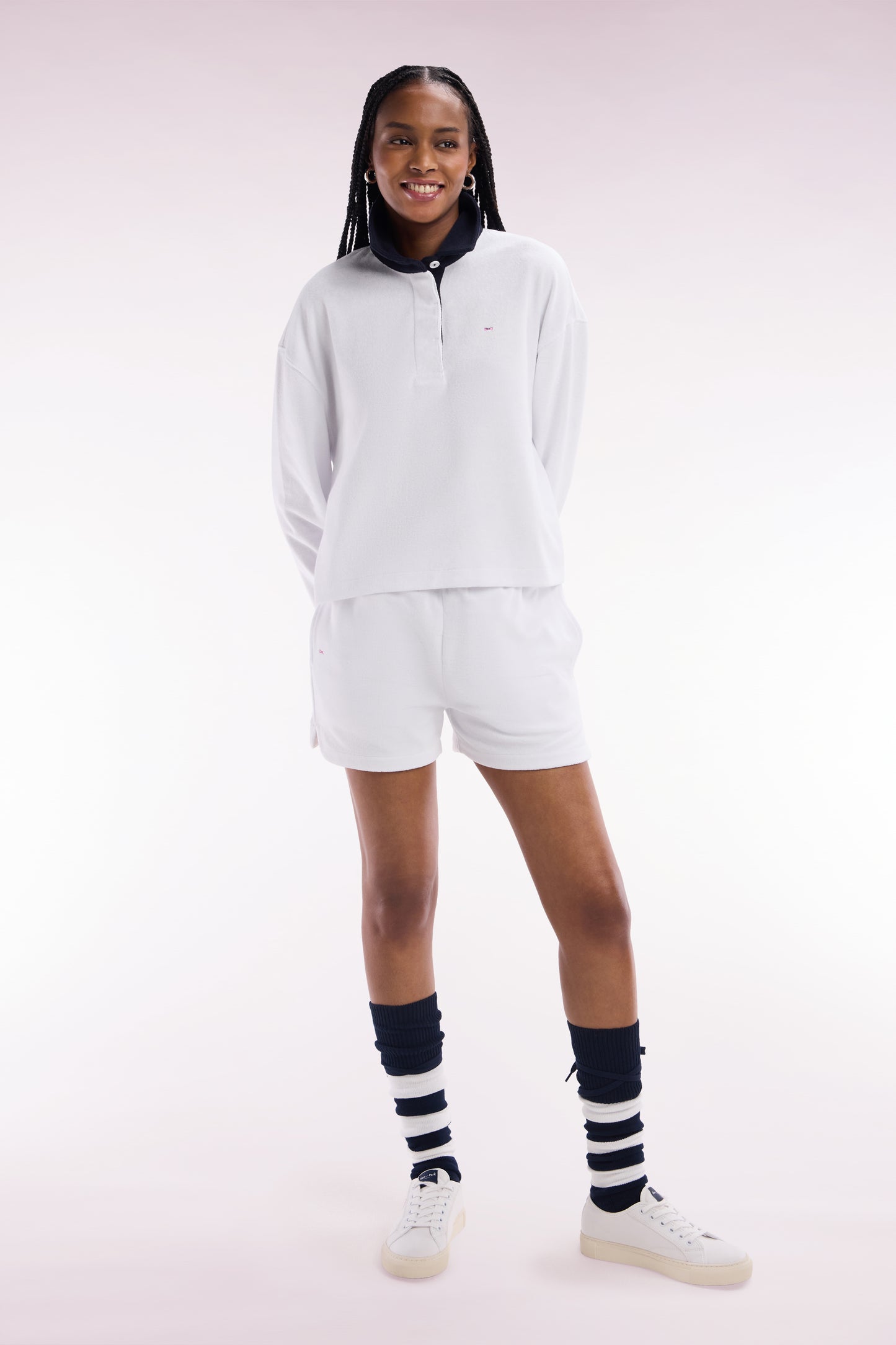 White cotton sweatshirt with navy rugby shirt collar