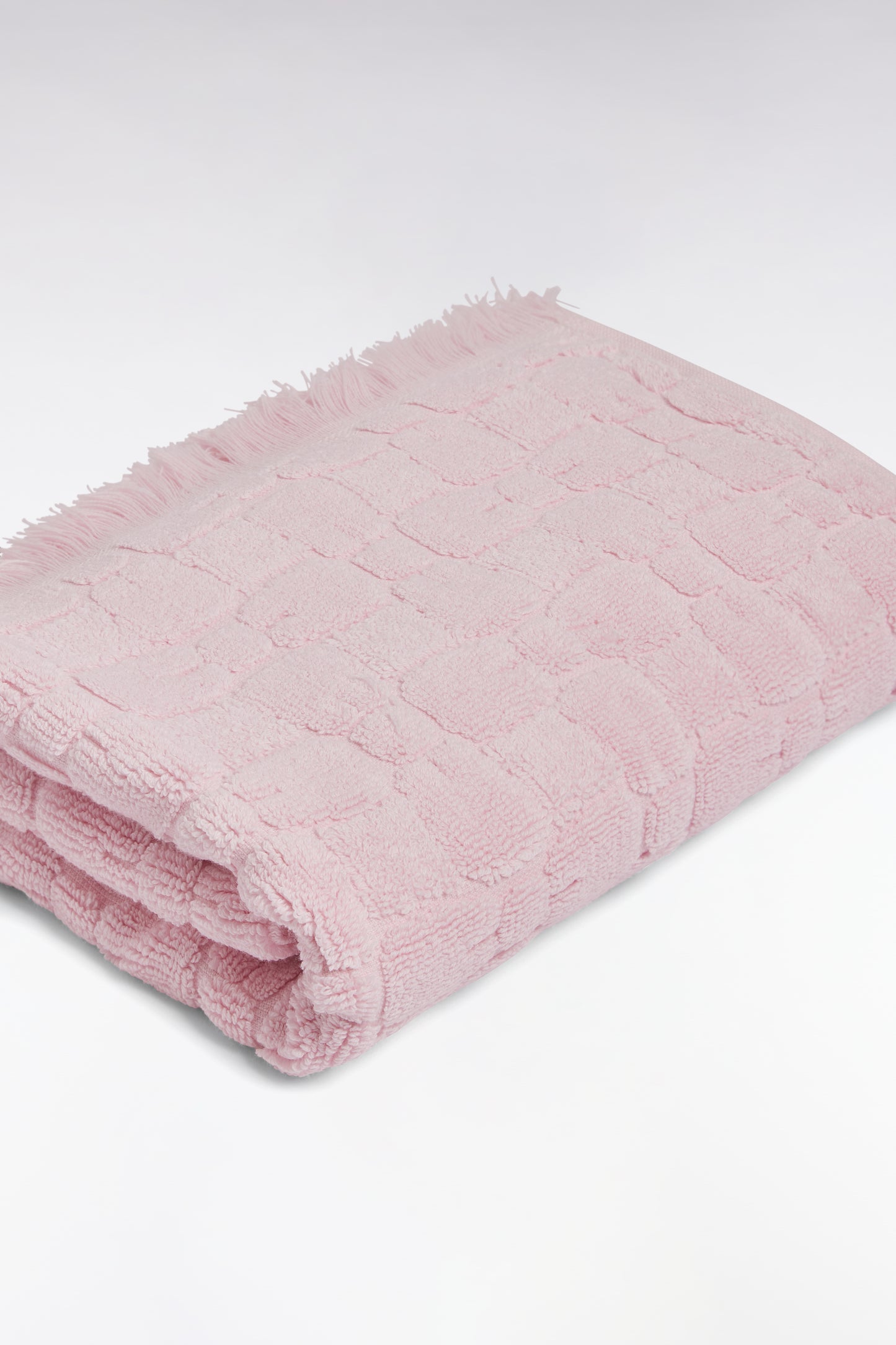 Serviette de toilette en coton rose à micromotifs nœuds papillon