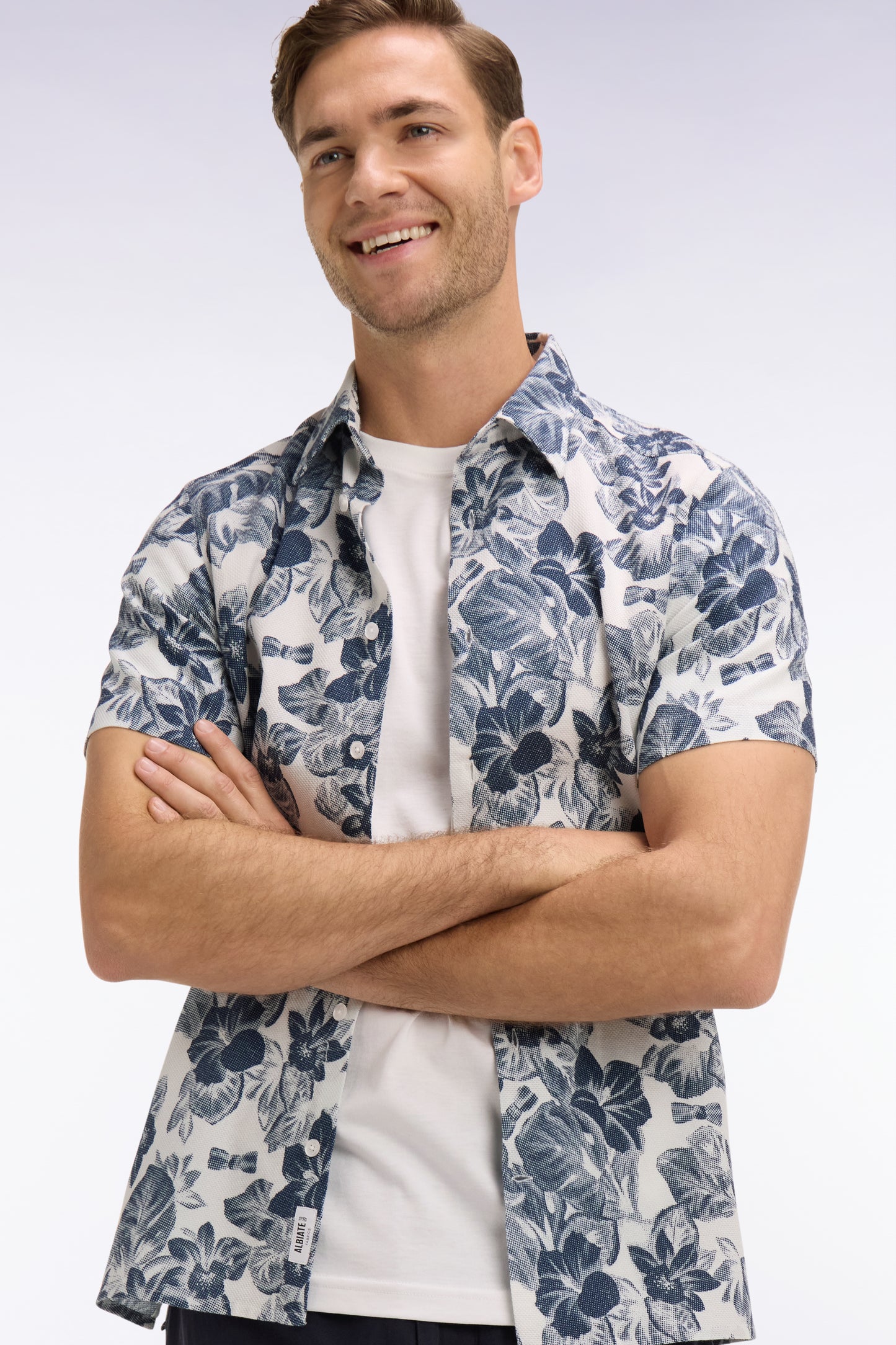 Chemise à manches courtes en piqué coton à motif floral marine coupe slim