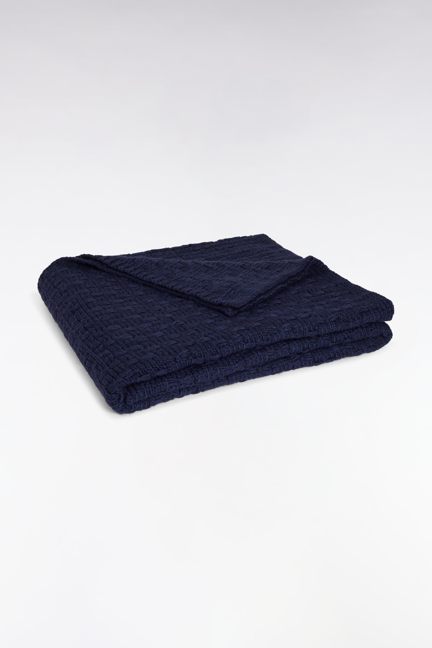 Navy knitted plaid with bow tie pattern