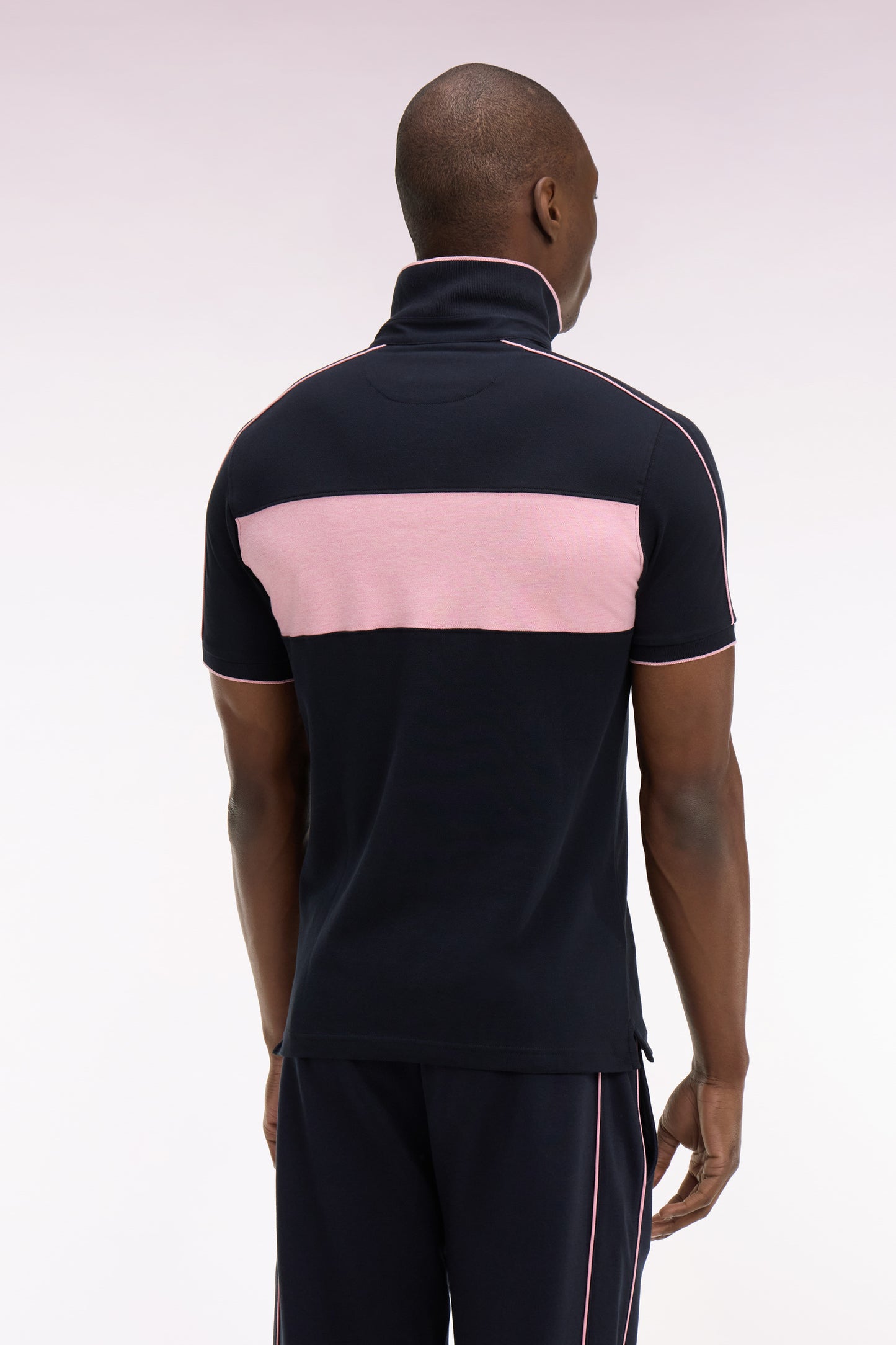 Polo à manches courtes en coton stretch rose coupe slim