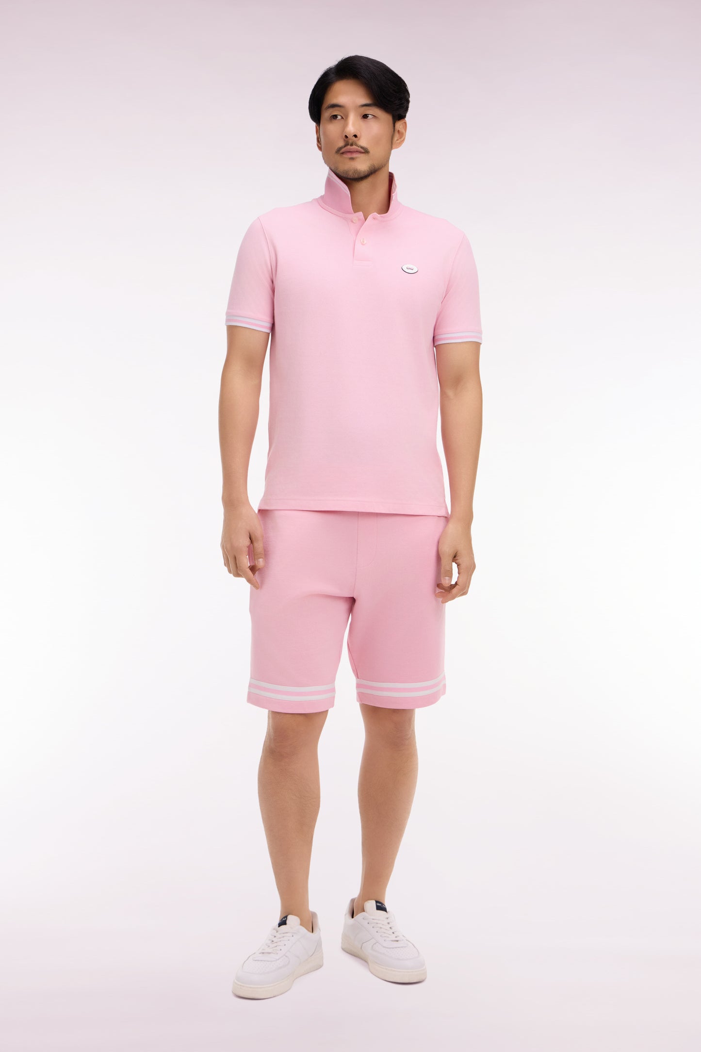 Short en molleton rose à bordures de jambe rayées