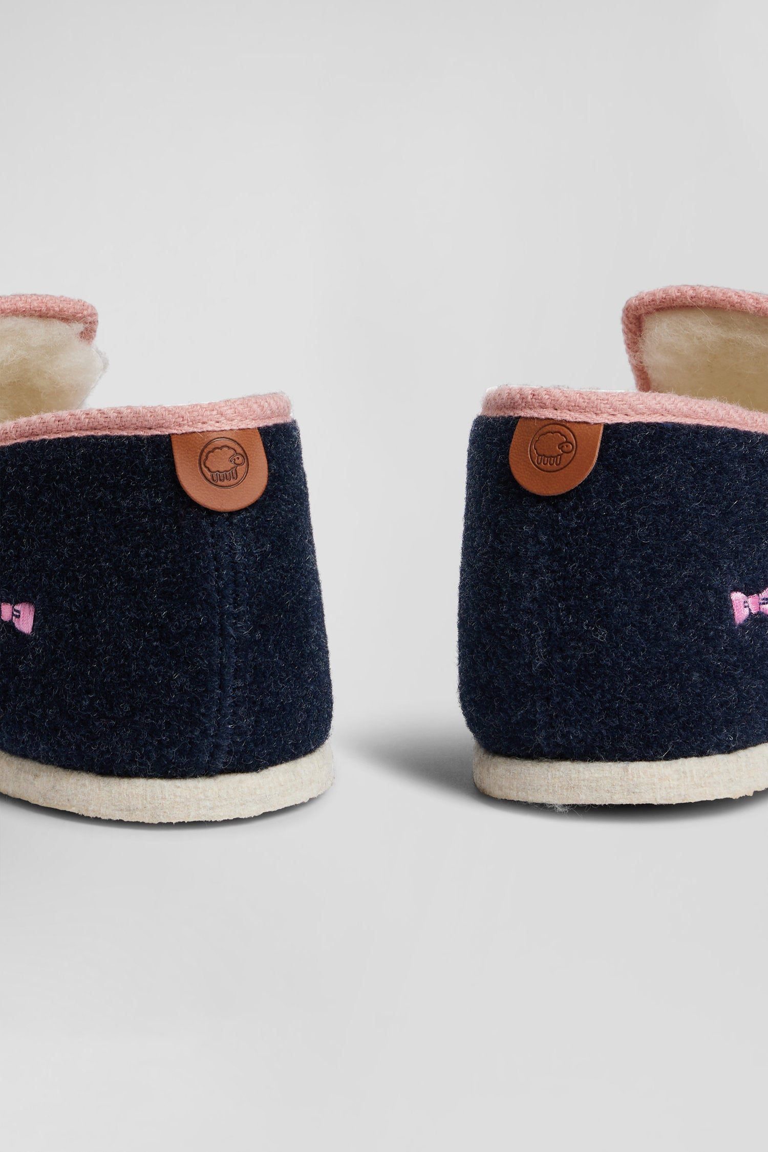 Navy blue felt and shearling slippers