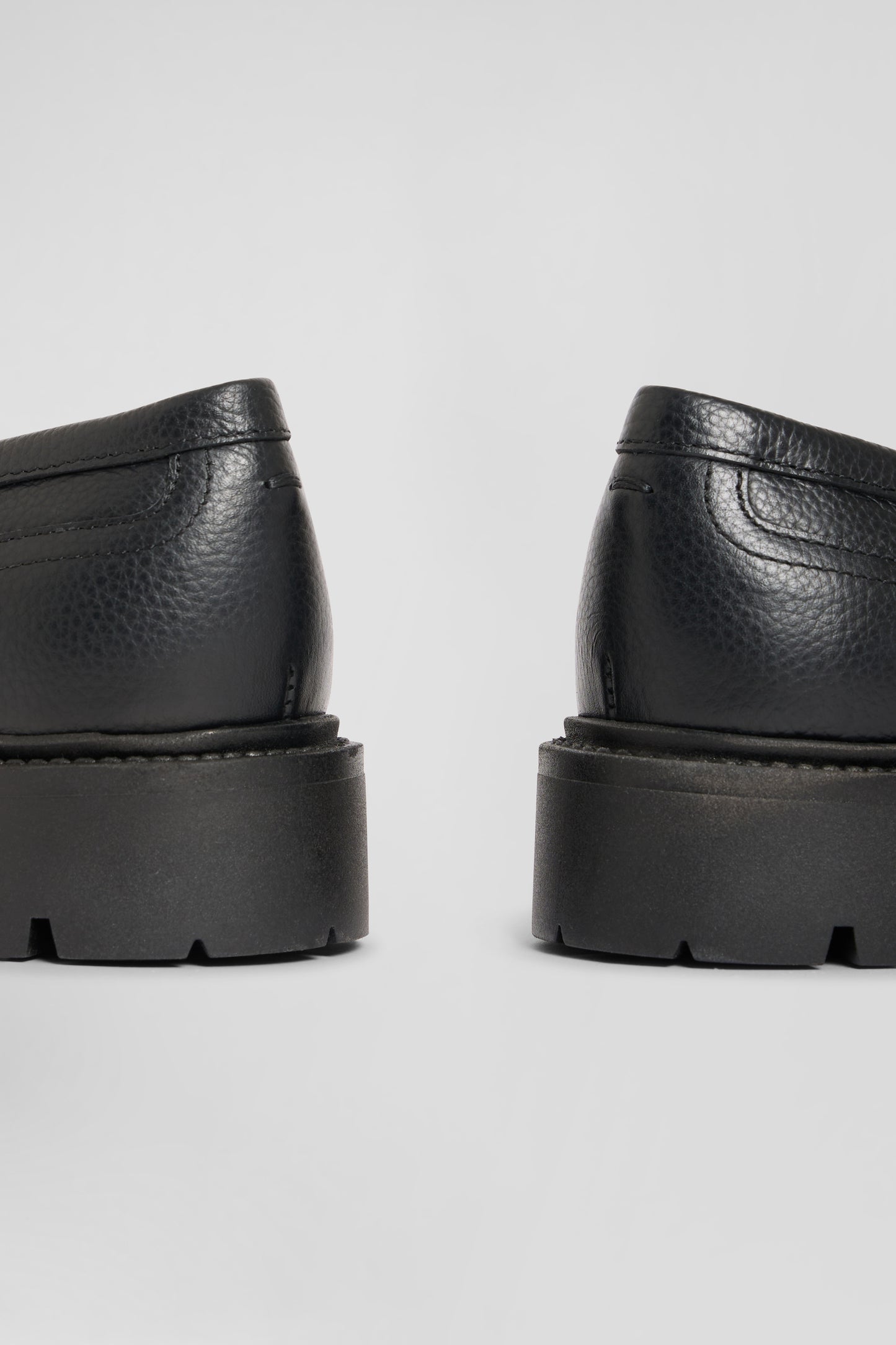 Black leather loafers