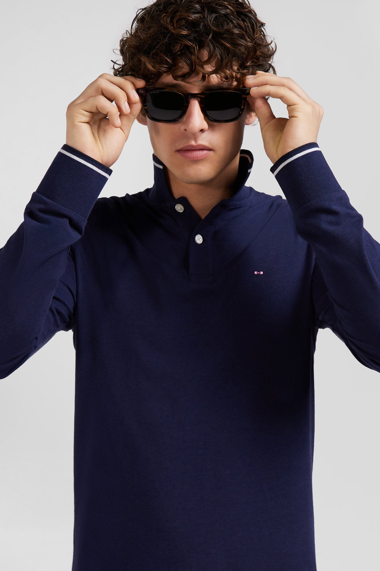 Slim navy blue long-sleeved stretch cotton polo shirt with striped finishes