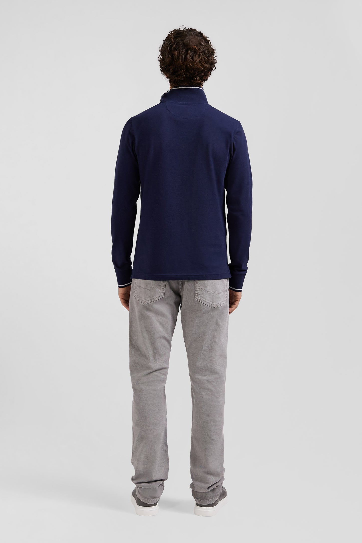 Slim navy blue long-sleeved stretch cotton polo shirt with striped finishes