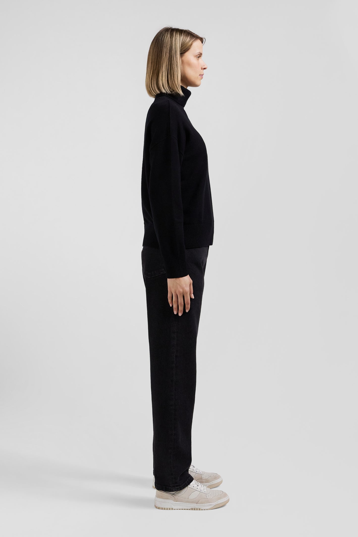 Relaxed black wool and cotton turtleneck jumper