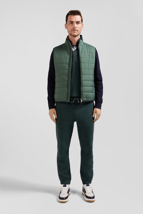 Green quilted sleeveless high collar down vest - Image 1