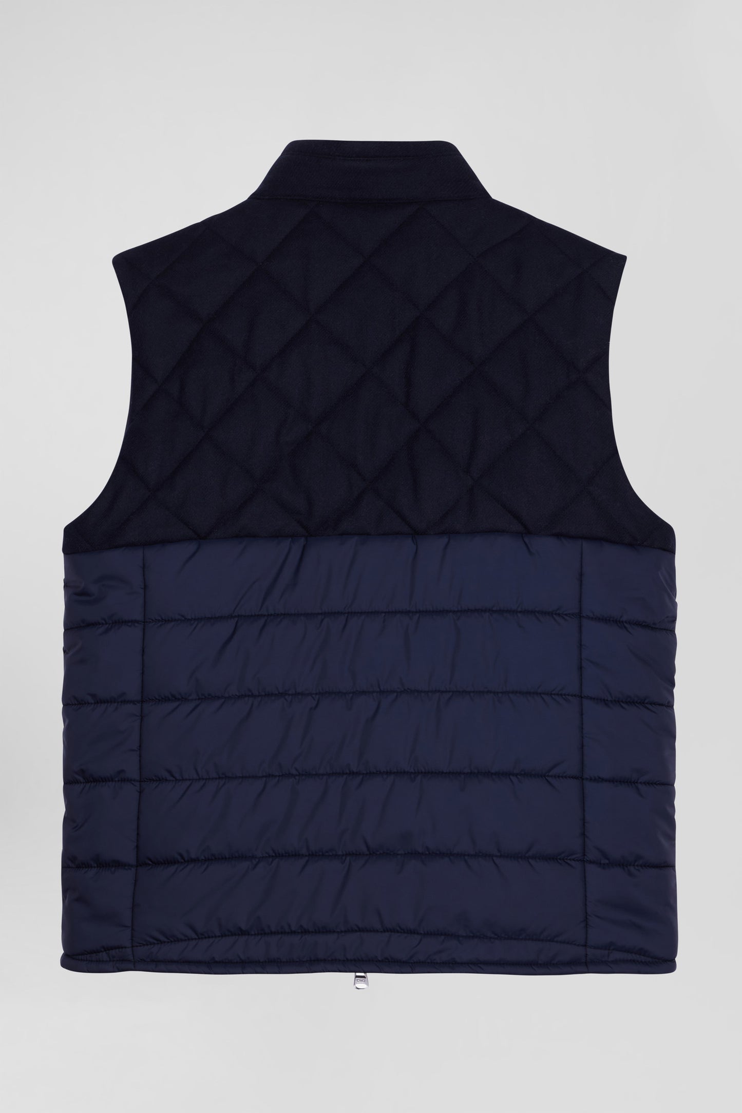 Navy blue sleeveless double quilted high collar down vest
