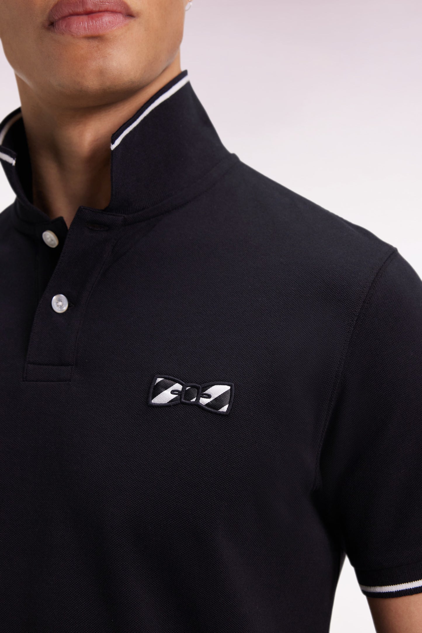 Polo à manches courtes en coton noir broderie cerclée