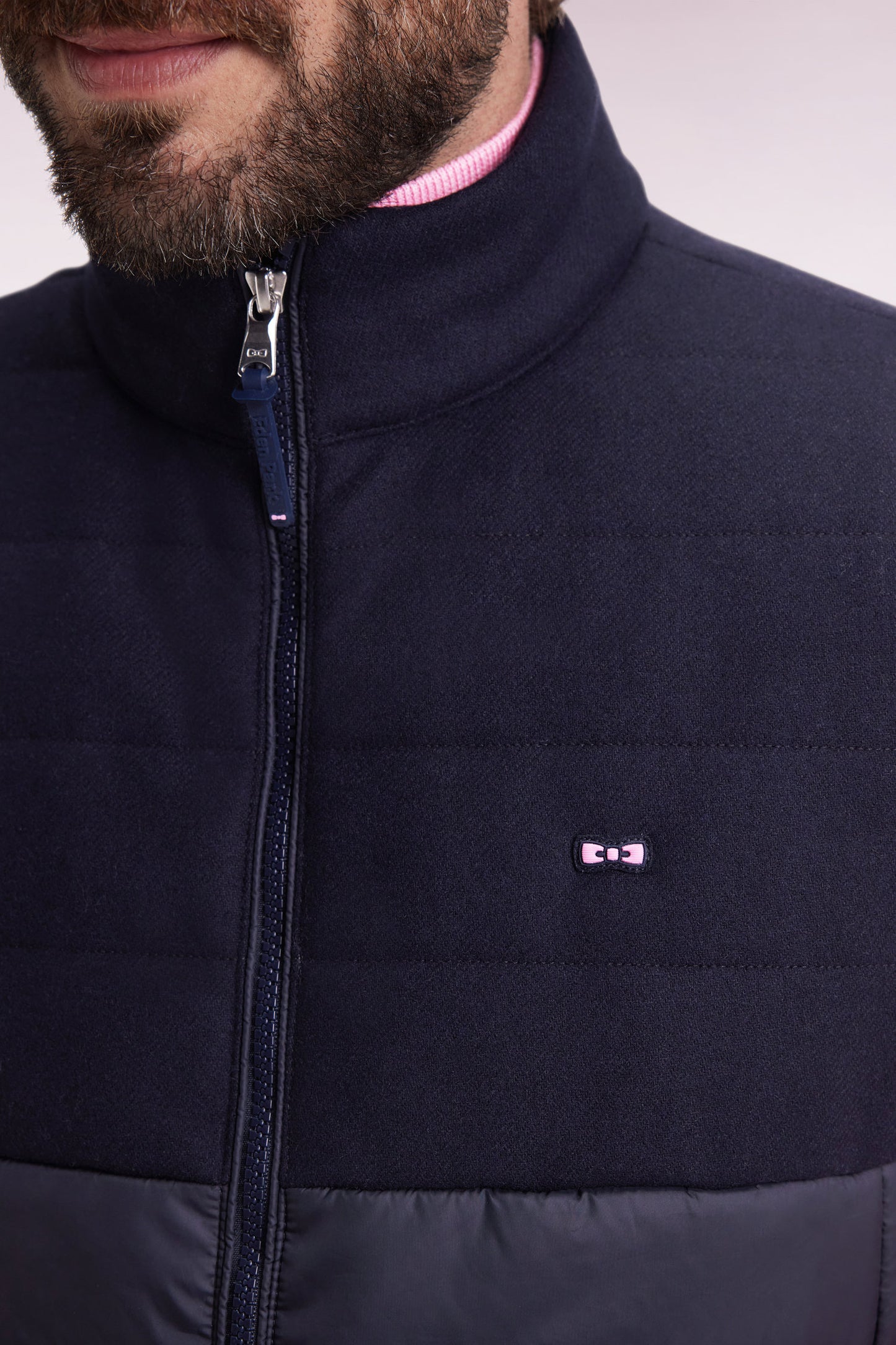 Two-material sleeveless down jacket in nylon and navy flannel