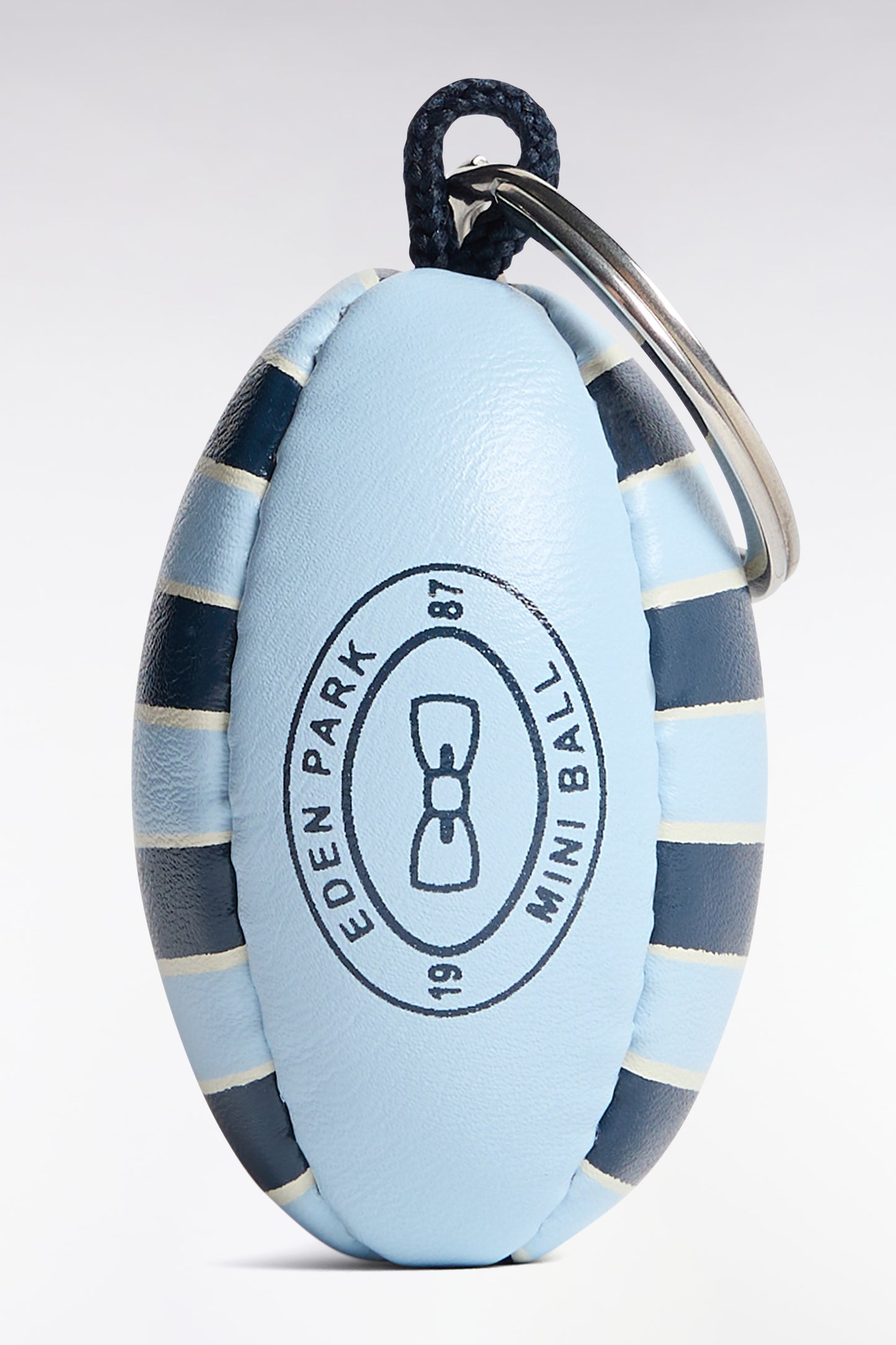 Porte-clés caoutchouc ballon de rugby ciel