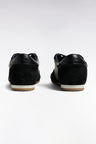 Black leather low-top sneakers