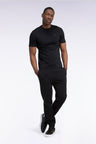 Jogging uni en molleton coton noir coupe droite