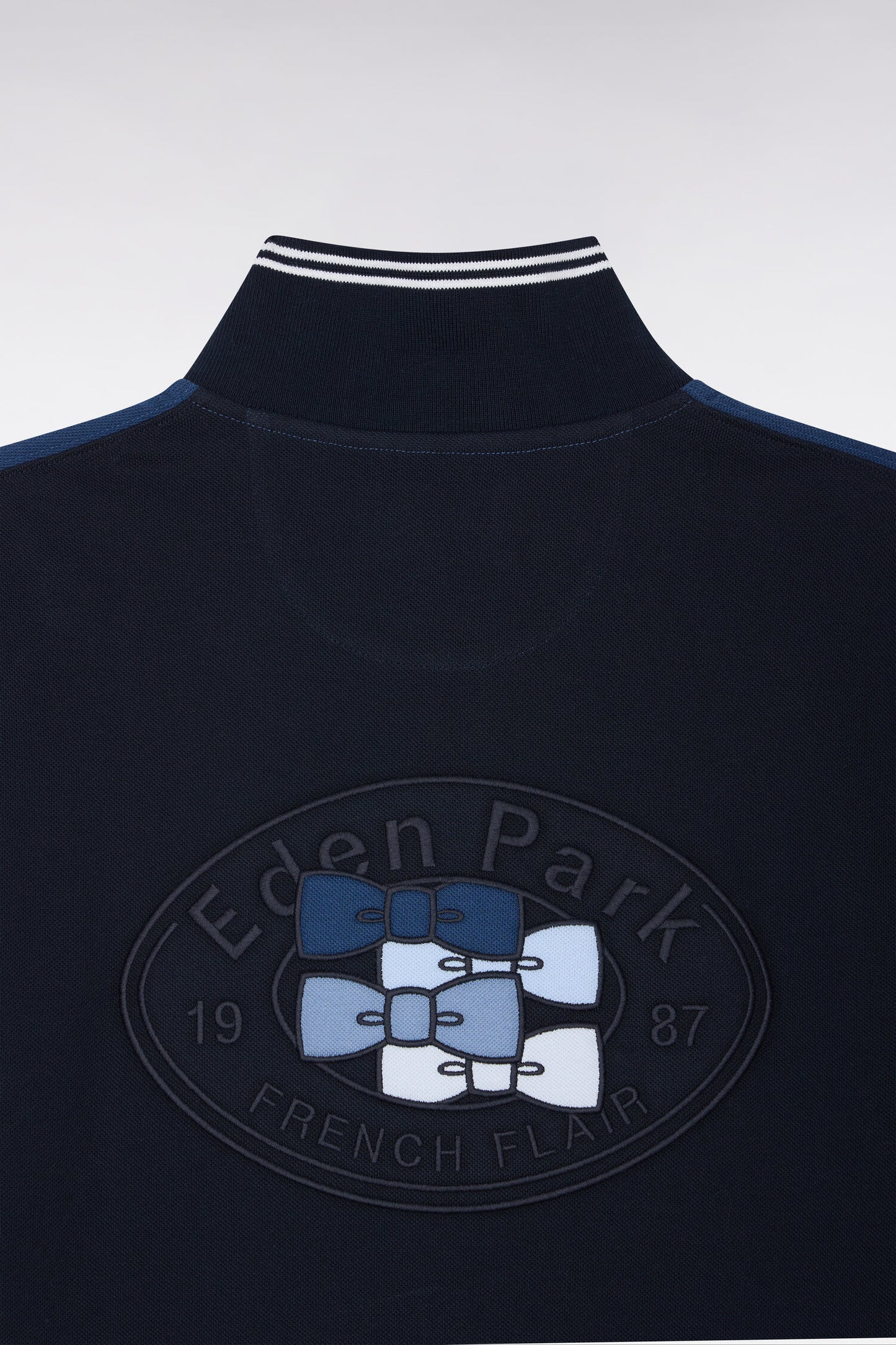 Polo manches courtes en coton tricolore bleu coupe droite