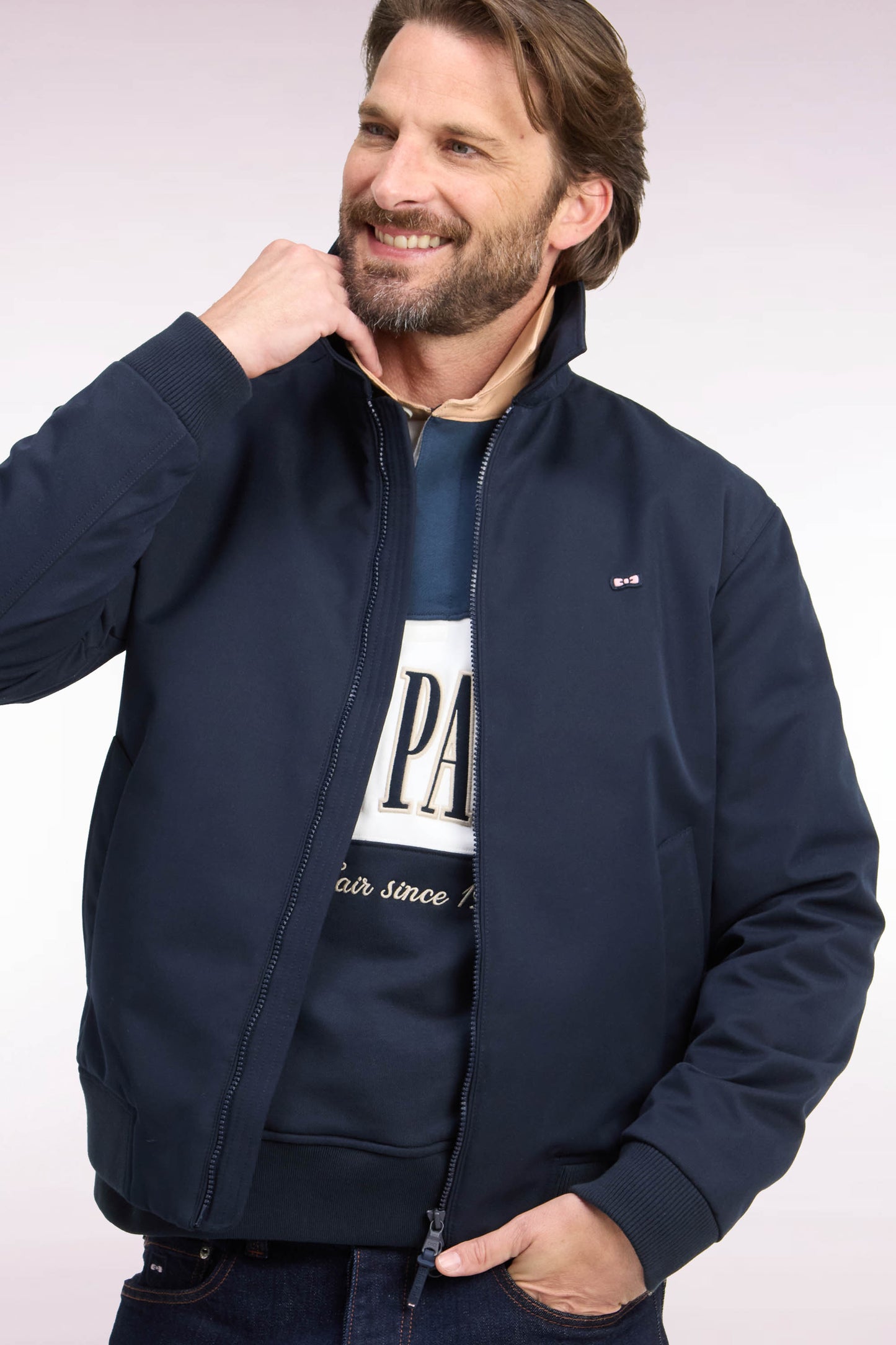 Blouson en nylon marine à bords-côtes coupe droite