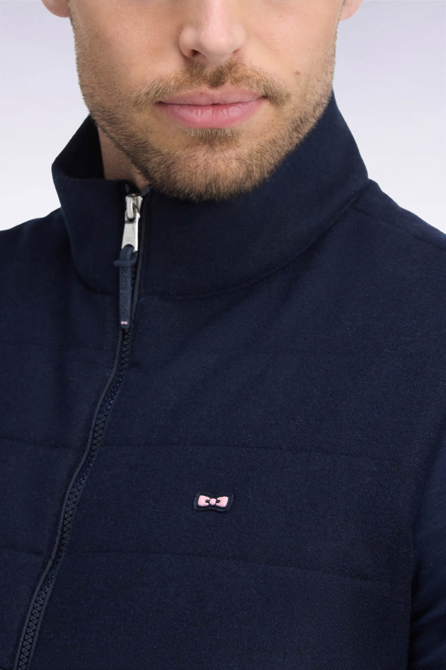 Doudoune sans manches bimatière en nylon et flanelle marine
