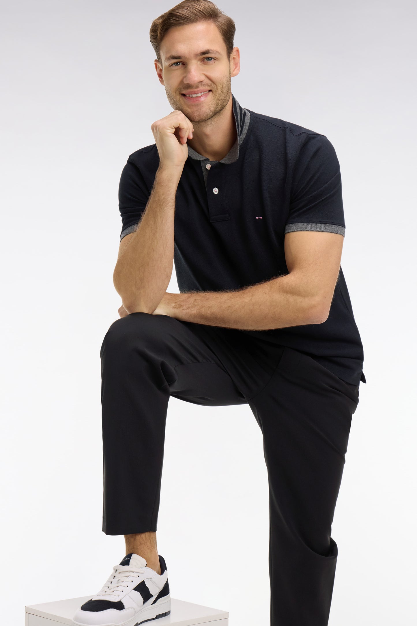 Black pima cotton polo with contrasting accents
