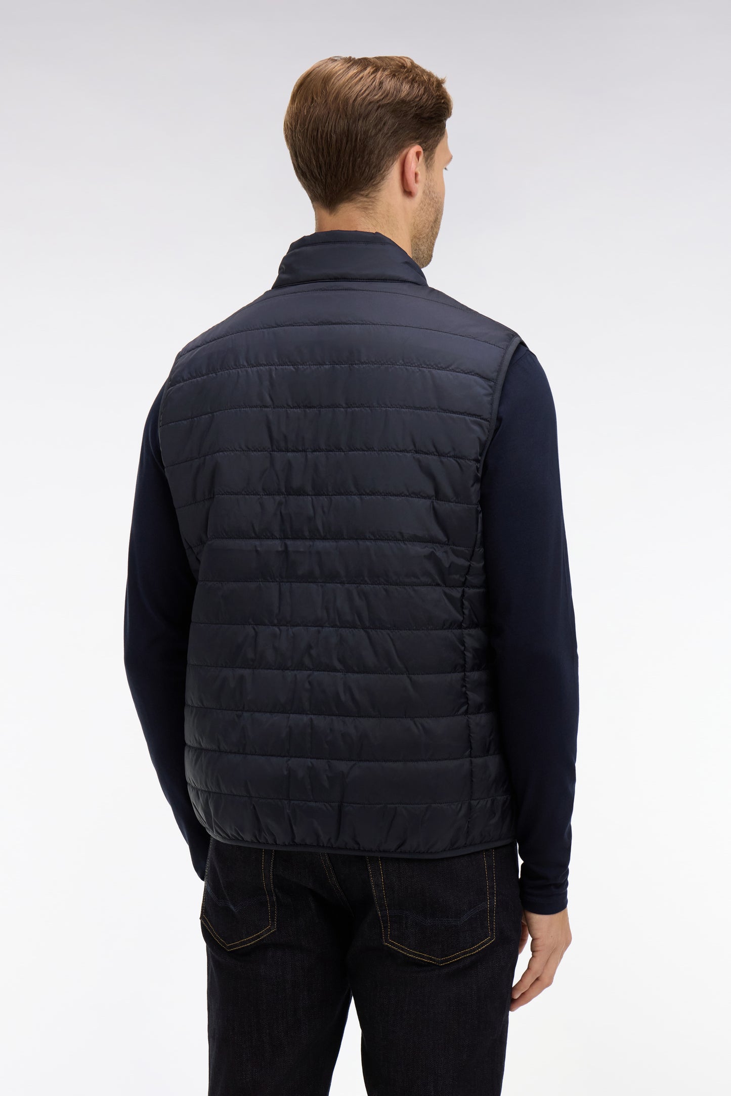 Navy blue sleeveless puffa jacket