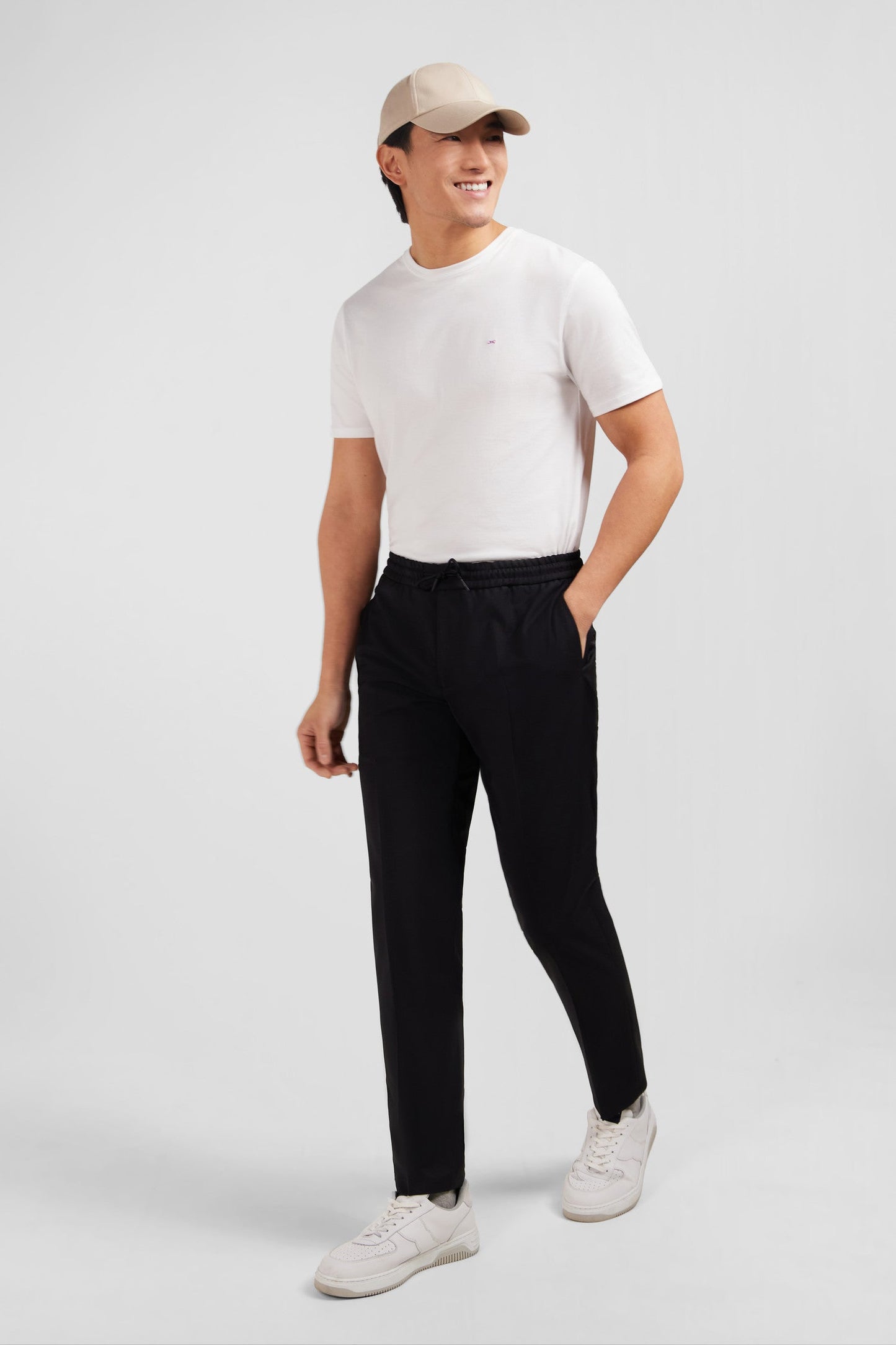 Black trousers with elasticated waist - Image 1