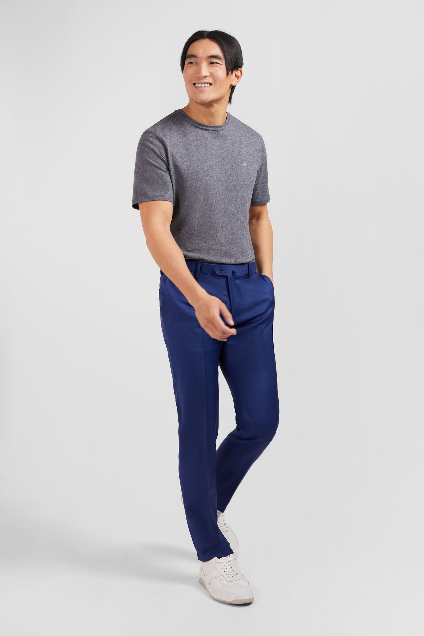 Pantalon slim bleu en laine à plis cassés