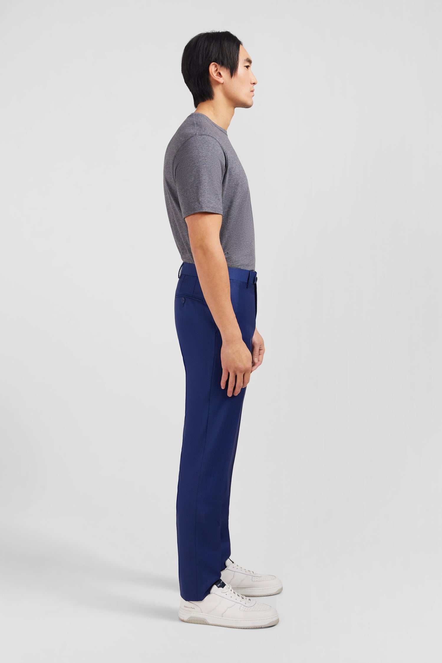 Pantalon slim bleu en laine à plis cassés