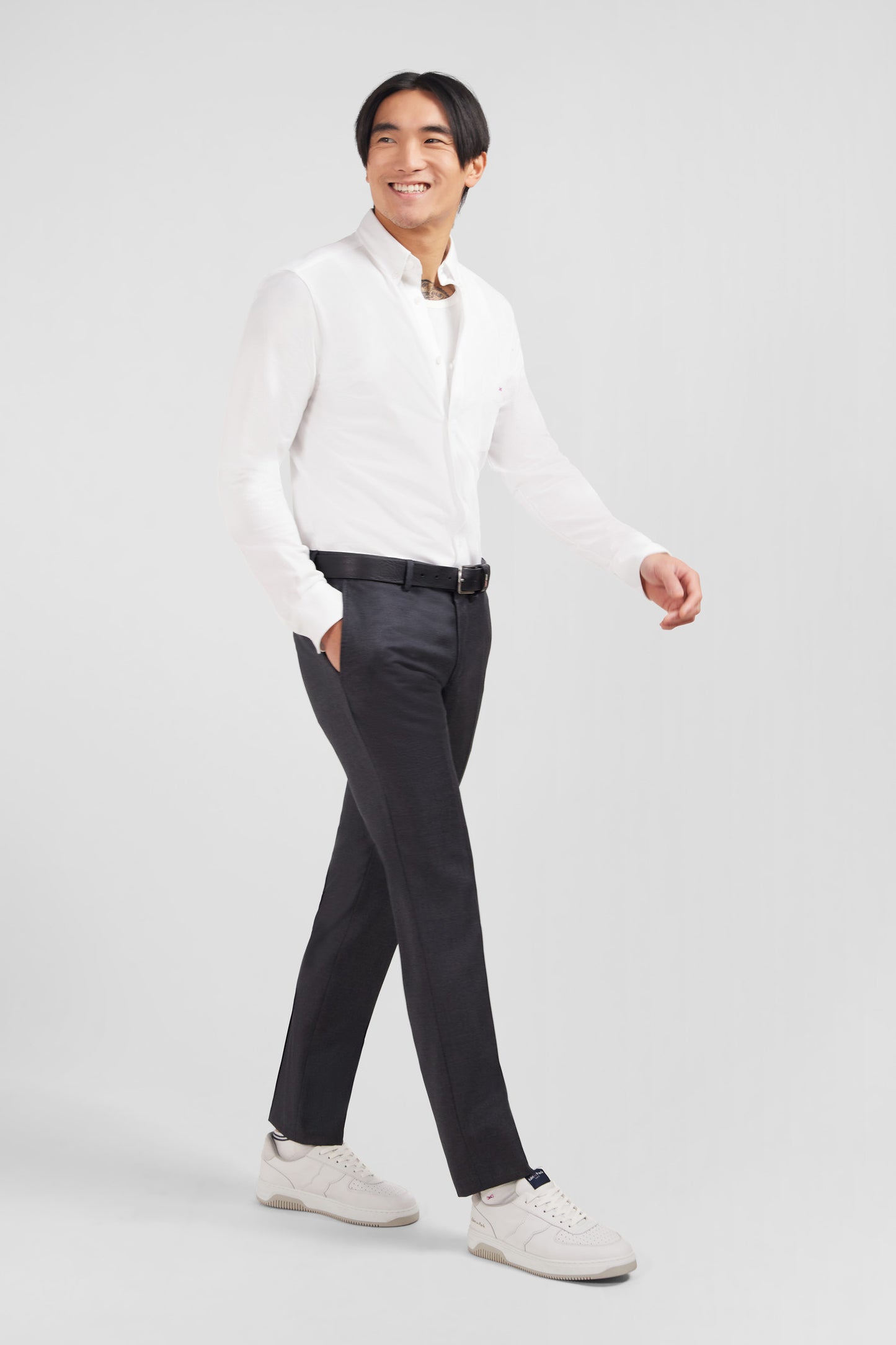 Pantalon slim gris en laine à plis cassés