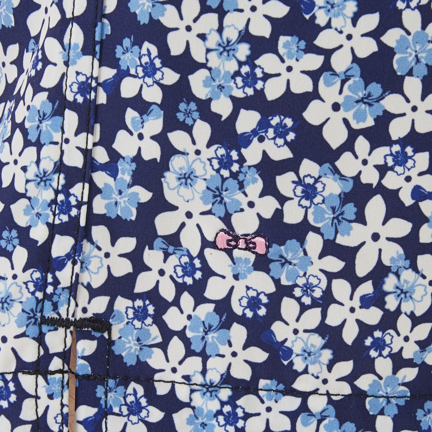 Blue swim shorts with floral pattern