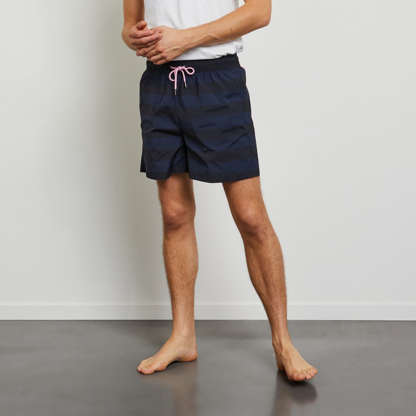 Navy blue striped swim shorts