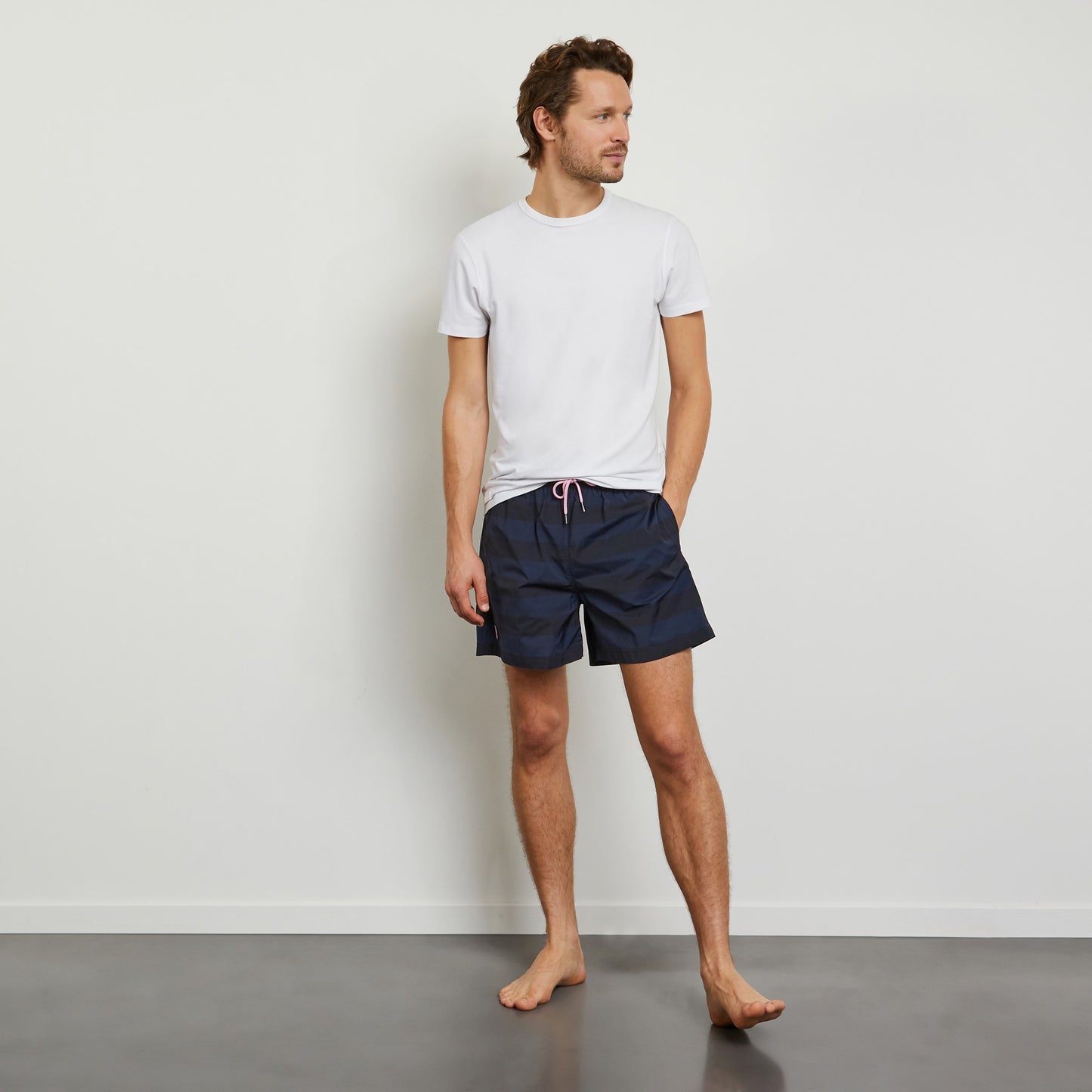 Navy blue striped swim shorts