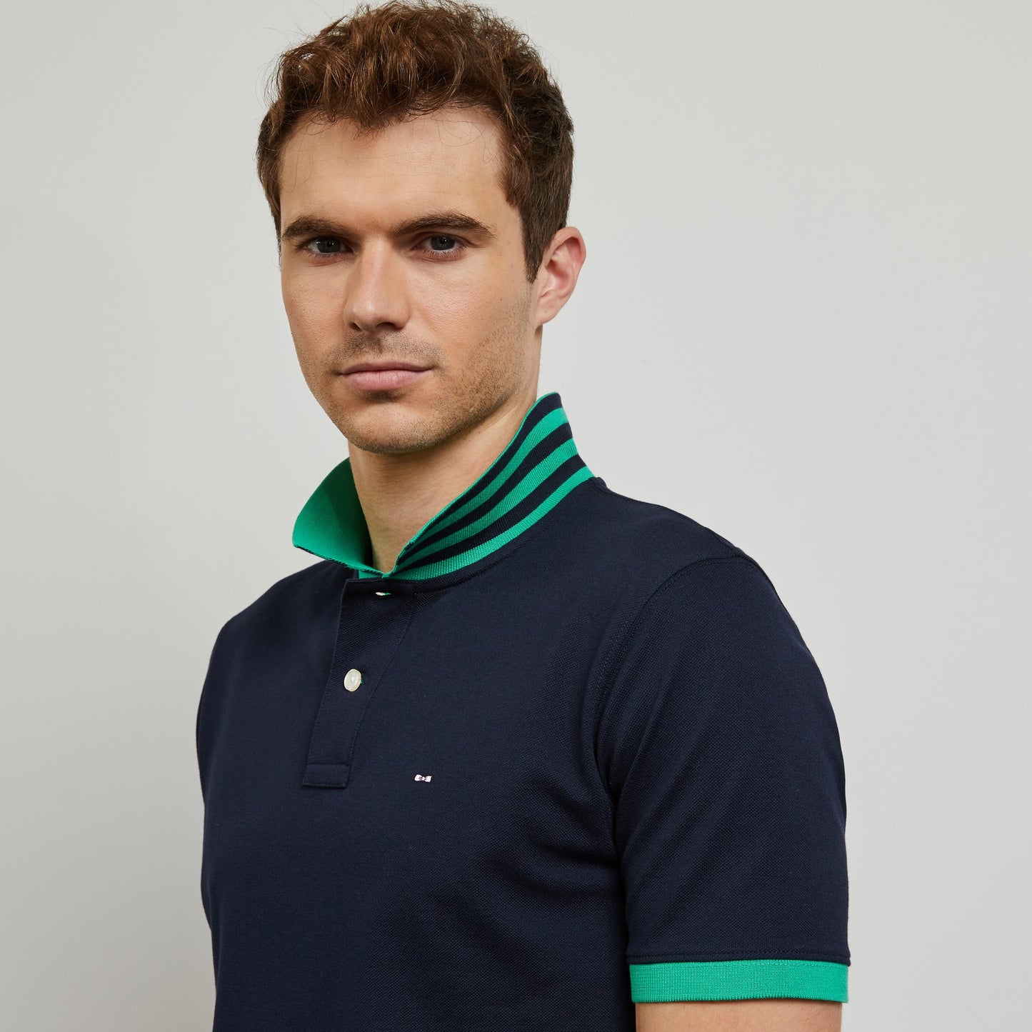 Polo bleu foncé à détails vert en coton Pima